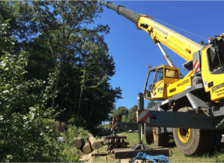 Large Yellow Strobert Tree Service Crane Performing Tree Removal in Berwyn, PA